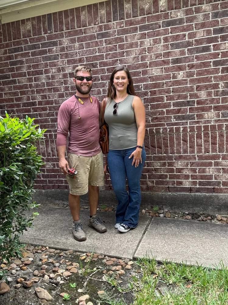 Reise and Kristin Pomroy at a Friendswood property