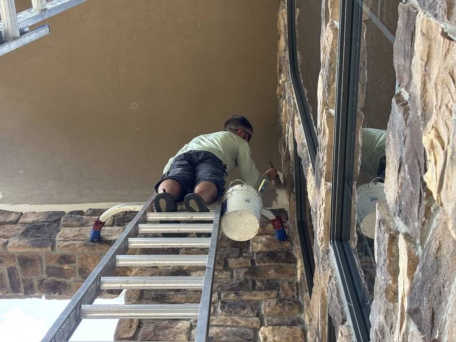 Painting exterior stone soffit