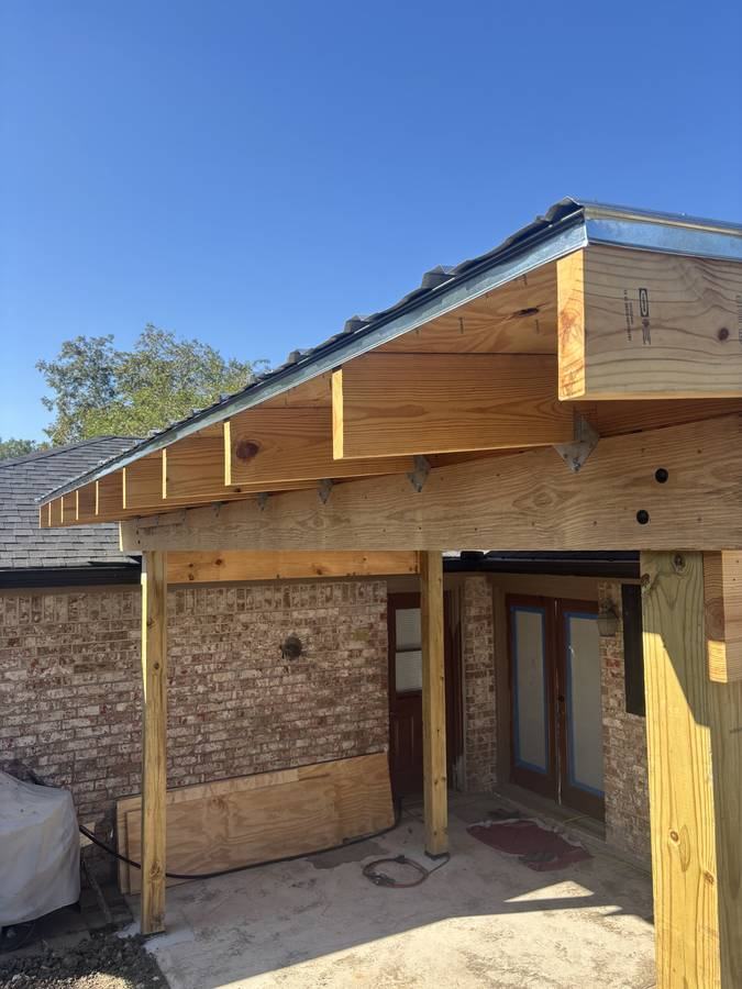 Completed porch with metal roof