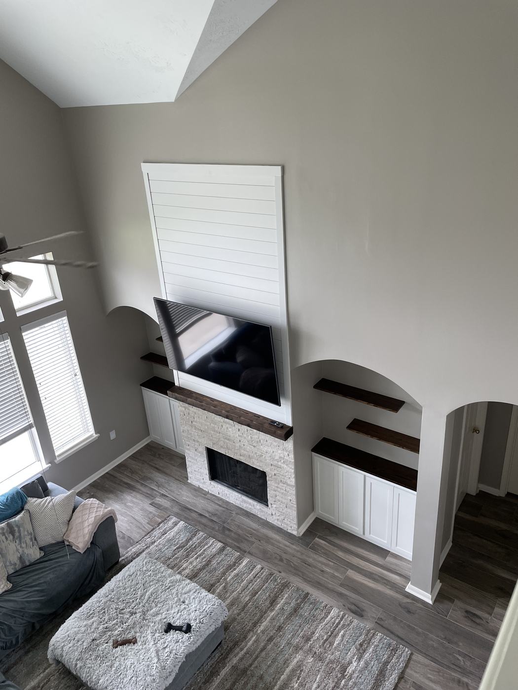 Shiplap fireplace wall with built-ins — wide view