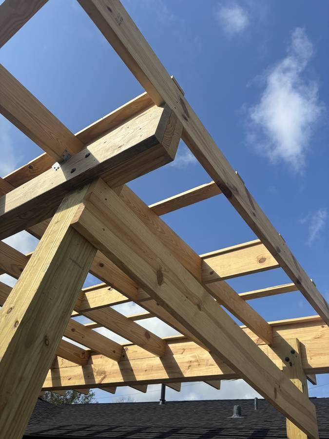 Timber pergola frame — looking up